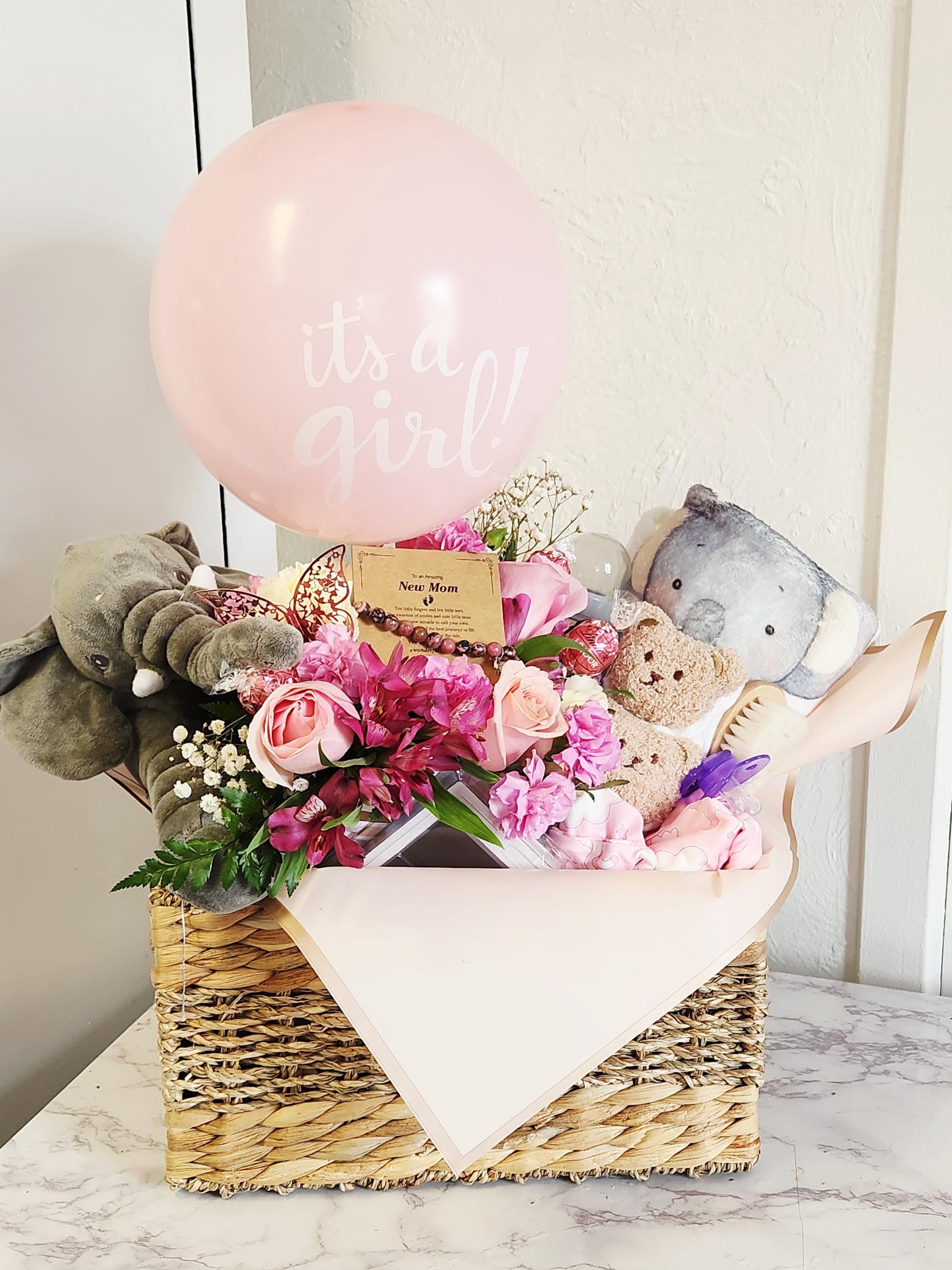 Baby girls welcome gift basket