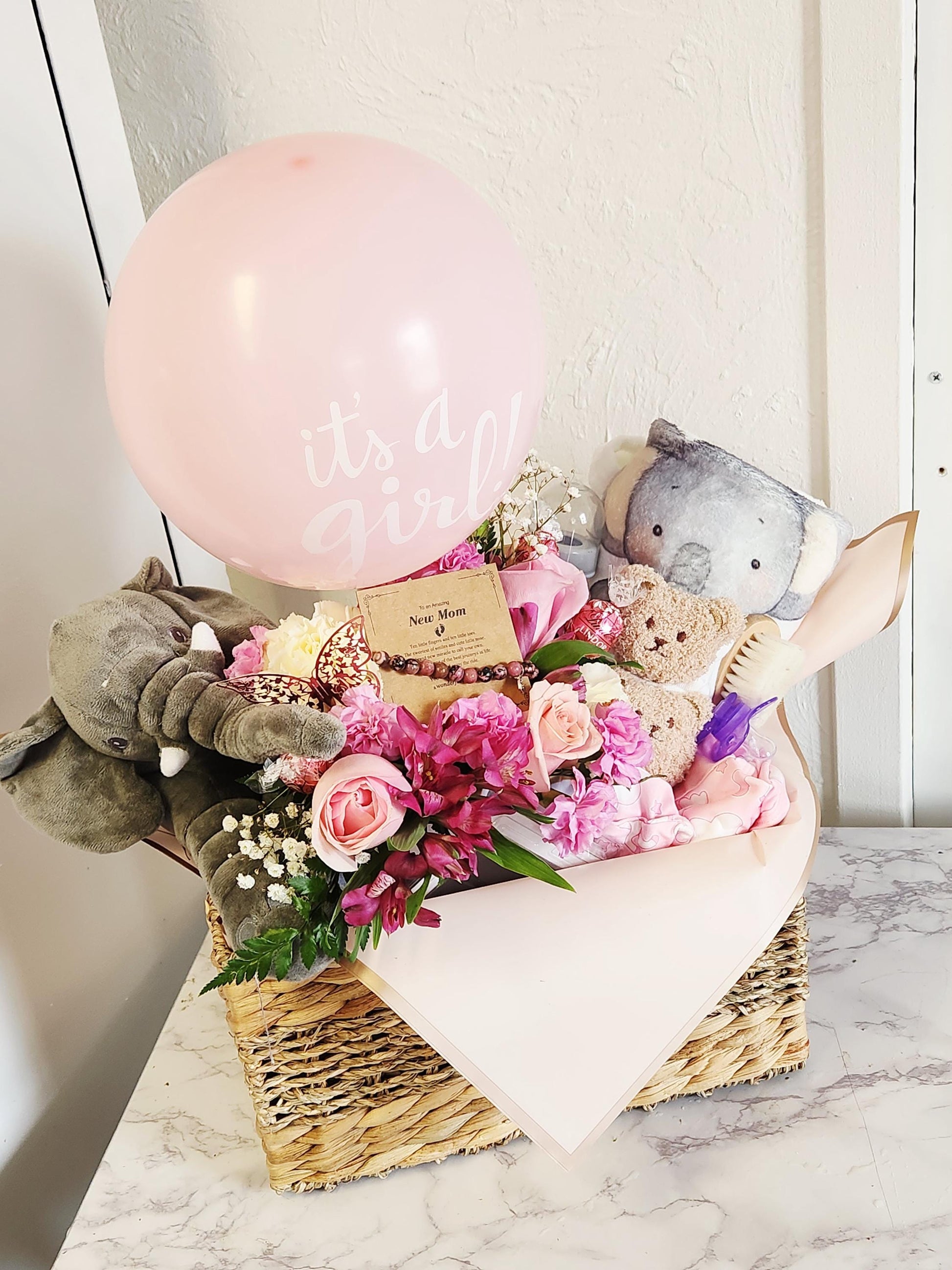 Baby girls welcome gift basket